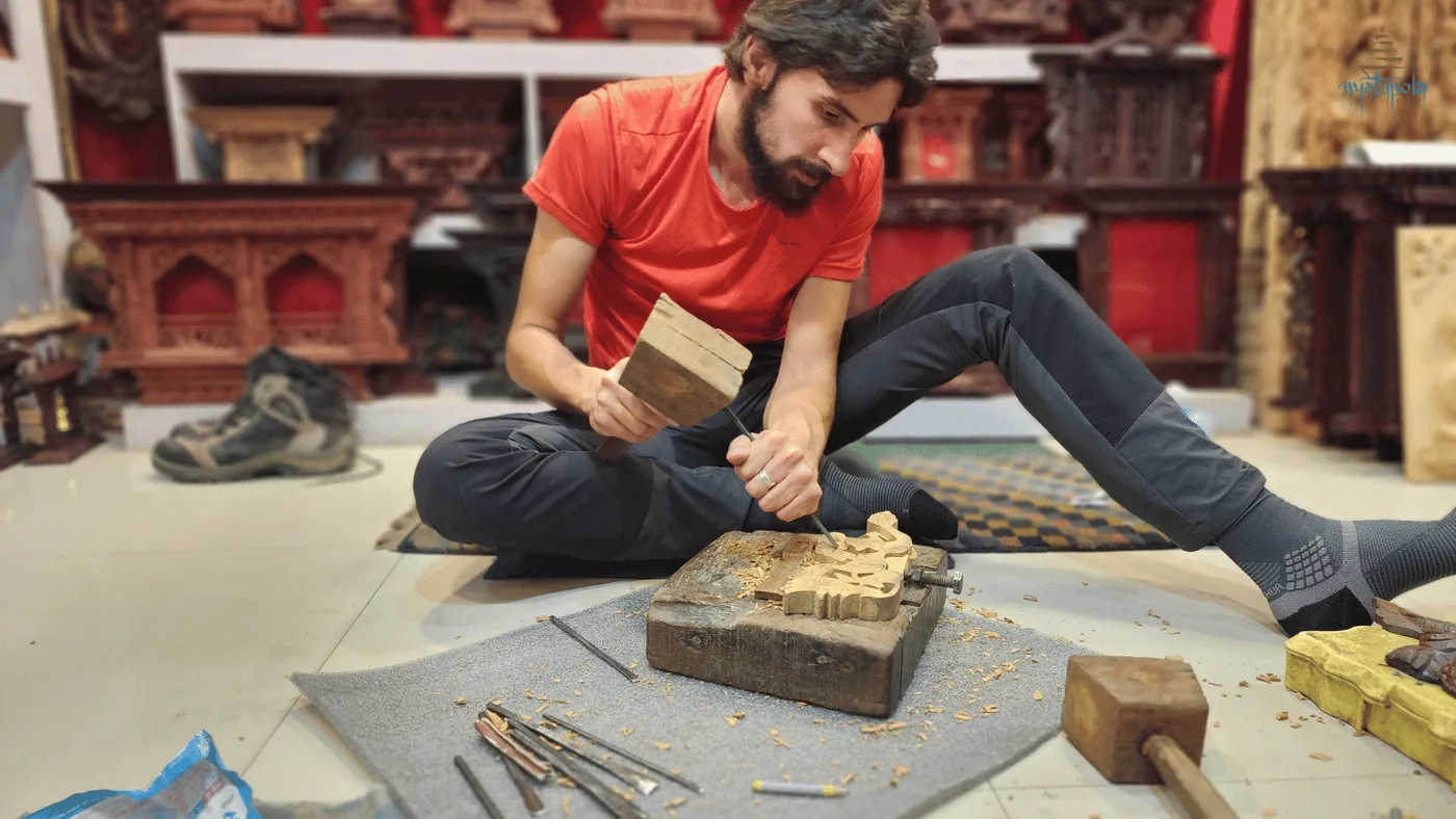An intermediate carved piece